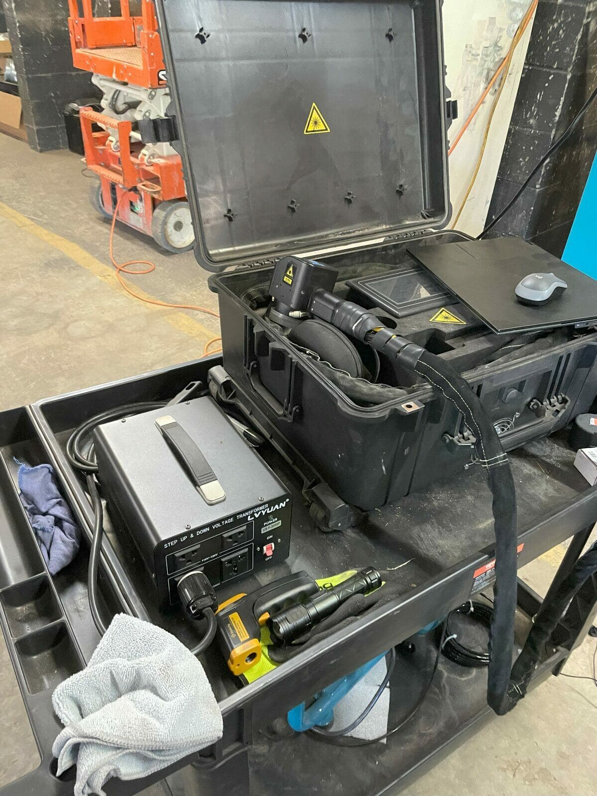 The field kit: laser gun, control case, transformer and IR thermometer